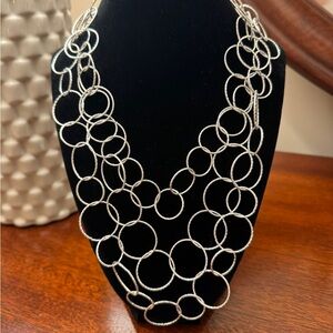 Three strand Silver ring statement necklace with adjustable clasp